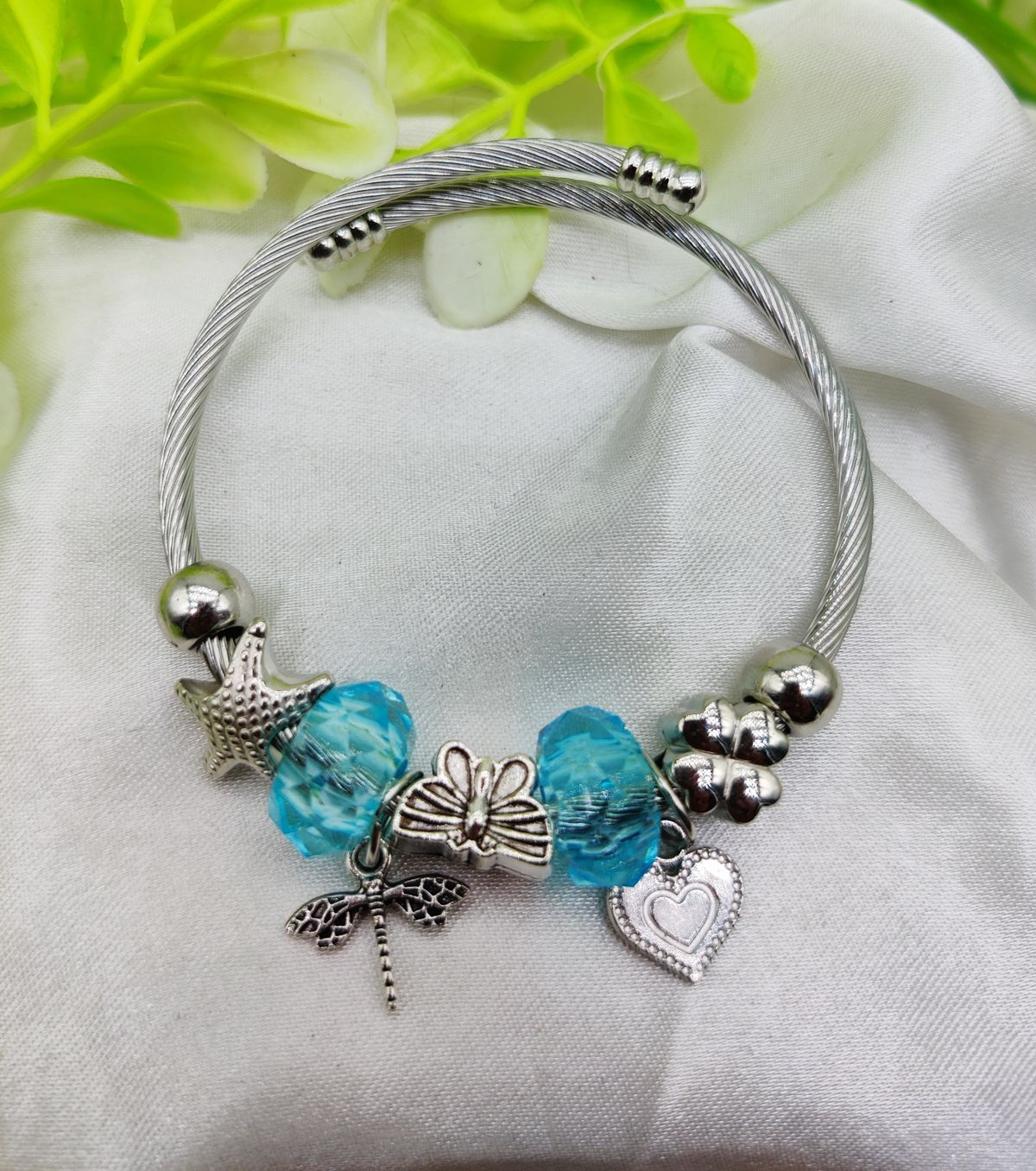 WhatsApp-Image-2025-02-04-at-4.24.53-PM.jpeg Imported Elegant Pandora-Inspired Silver Charm Bracelet with Ocean Blue Beads, Starfish, Butterfly, Dragonfly & Heart Charms | Girls & Women Jewellery - Image 1